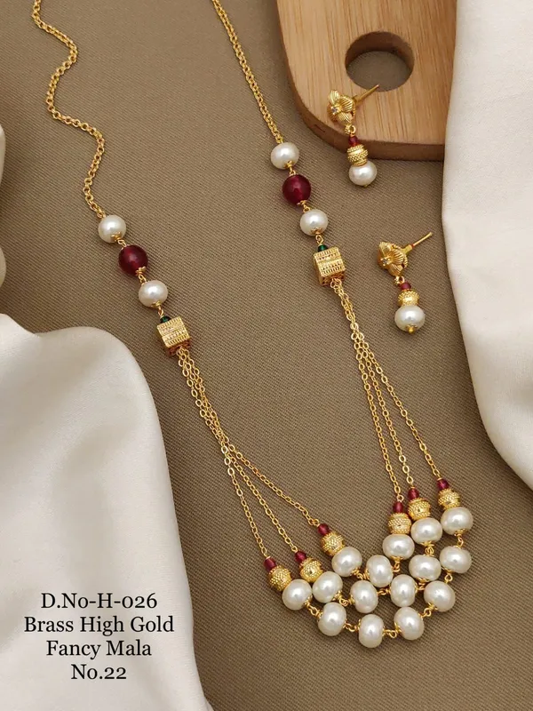 https://d1311wbk6unapo.cloudfront.net/NushopCatalogue/tr:f-webp,w-600,fo-auto/D.No-H-026 Brass High Gold Fancy Moti Mala_1689666235227_25z8k5f5fk3ctrw.jpg__Ketmera